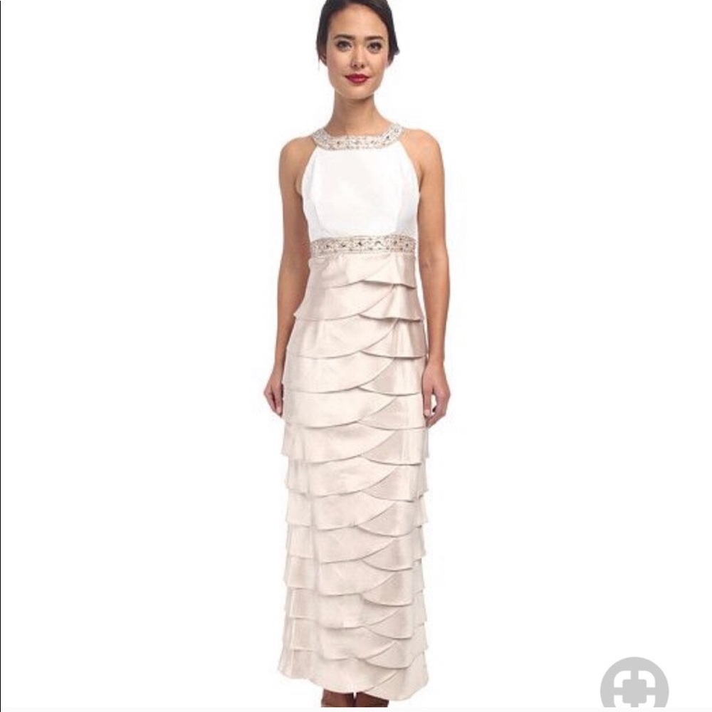 Jessica Howard gown with artichoke skirt.